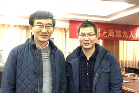 冯观保与上海九院种植科副主任吴秩群教授学习交流时合影